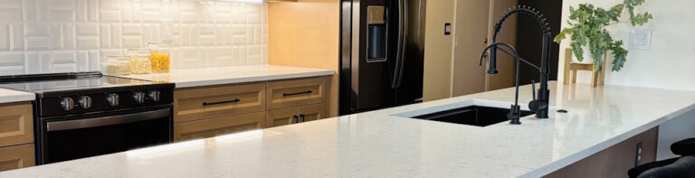 remodeled kitchen with stone countertops